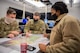 Tech. Sgt. Joseph McCoy, Tech. Sgt. Eric Hill, 2nd Security Forces Squadron flight chiefs, and Master Sgt. Tamieka Morgan, 2nd SFS defense force operator, search for a route to a crash site at Barksdale Air Force Base, La., Dec. 16, 2020. Airmen from the 2nd SFS, 2nd Civil Engineer Squadron, 2nd Medical Group, 2nd Logistics Readiness Squadron and local authorities worked in conjunction to locate and effectively respond to a civilian light aircraft crash on the east side of Barksdale. (U.S. Air Force photo by Senior Airman Lillian Miller)