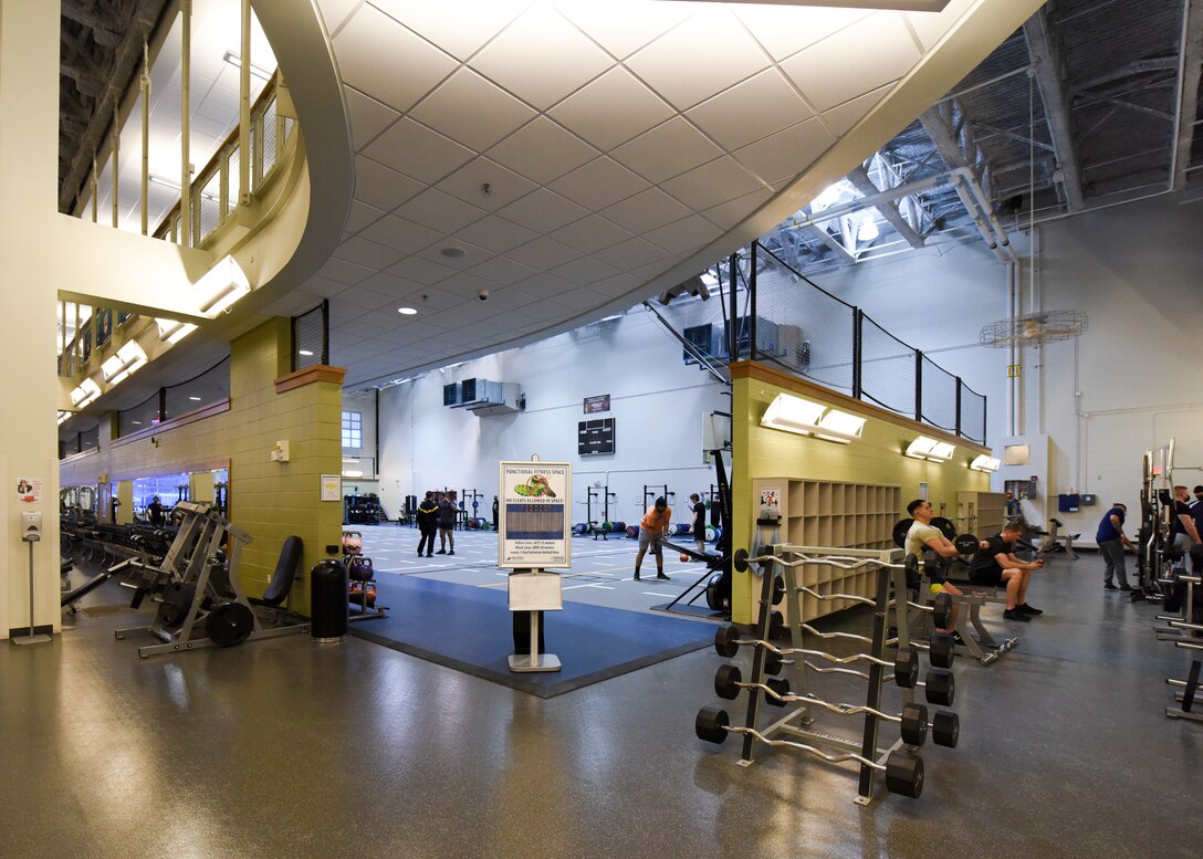 Free weights and professional grade equipment sit ready for use at the Buckner Fitness Center on Joint Base Elmendorf-Richardson, Alaska, Dec 14, 2020. In addition to state-of-the-art equipment Buckner also includes an aquatic center, fitness pool, rock climbing wall, an indoor running track and an abundance of new strength and cardio machines. (U.S. Air Force photo by Senior Airman Crystal A. Jenkins)