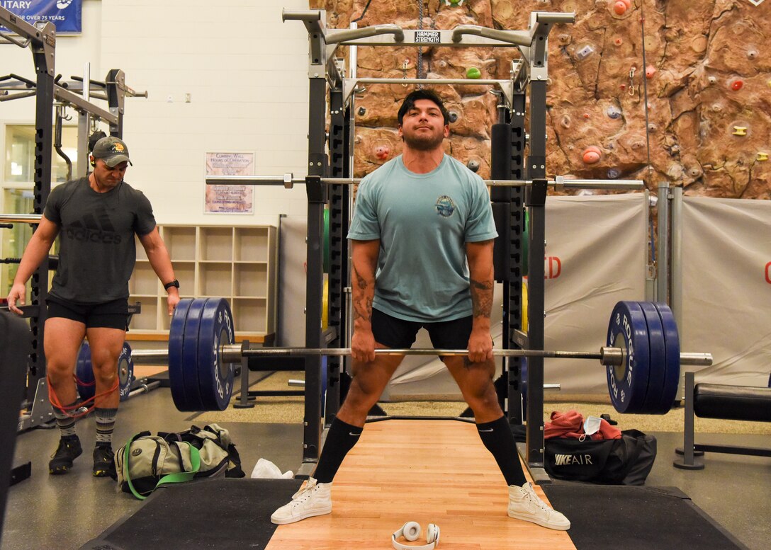 Retired U.S. Army Medic Angel Amador practices a Sumo deadlift at the Buckner Fitness Center on Joint Base Elmendorf-Richardson, Alaska, Dec 14, 2020. In addition to state-of-the-art equipment Buckner also includes an aquatic center, fitness pool, rock climbing wall, an indoor running track and an abundance of new strength and cardio machines. (U.S. Air Force photo by Senior Airman Crystal A. Jenkins)