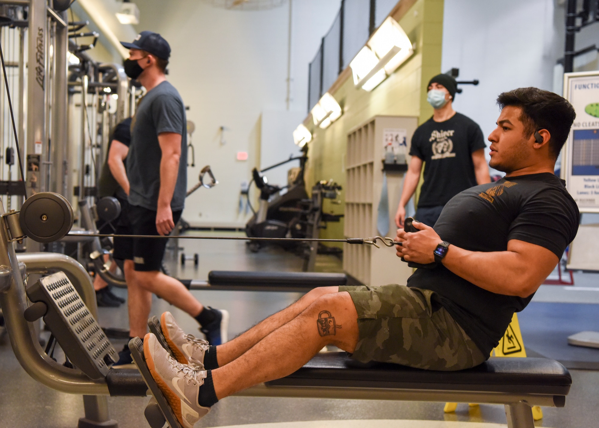 U.S. Army Pvt. Fernando Manriquez, a paratrooper assigned to Comanche Company, 1st Battalion, 501st Parachute Infantry Regiment, 4th Infantry Brigade Combat Team (Airborne), 25th Infantry division, U.S. Army Alaska, works out on a cable row machine at the Buckner Fitness Center on Joint Base Elmendorf-Richardson, Alaska, Dec 14, 2020. In addition to state-of-the-art equipment Buckner also includes an aquatic center, fitness pool, rock climbing wall, an indoor running track and an abundance of new strength and cardio machines. (U.S. Air Force photo by Senior Airman Crystal A. Jenkins)