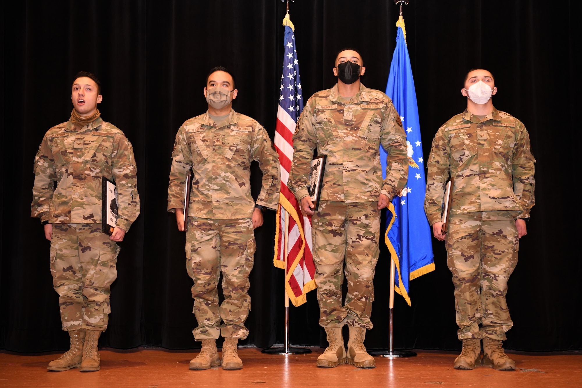 Award winners of ALS Class 21-B stand for recognition during their class graduation Dec. 17, 2020, on F. E. Warren Air Force Base, Wyo.