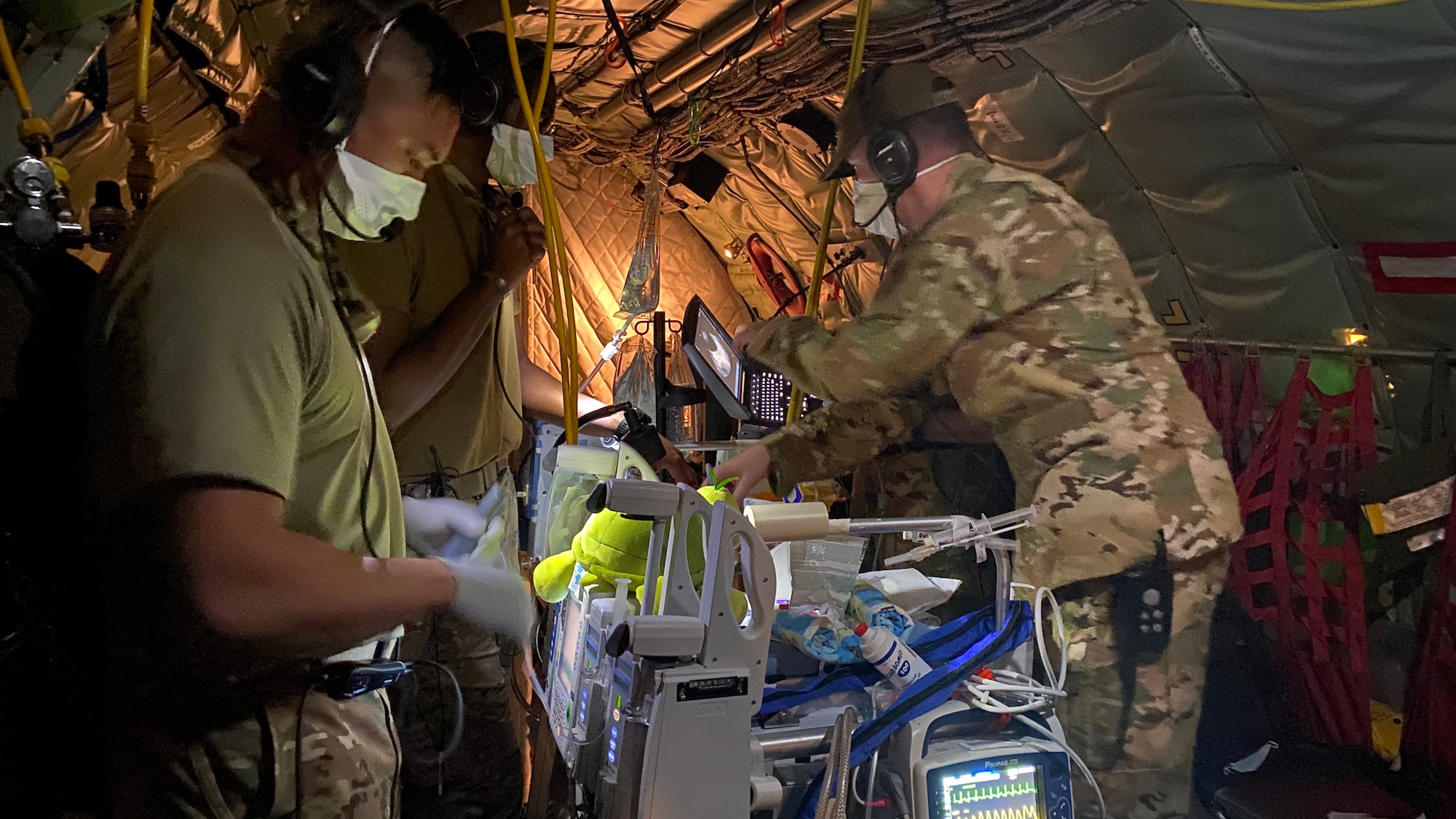 The 18th Medical Group Critical Care Air Transport Team provides medical care to a patient during a flight aimed at getting the patient to a higher echelon of care. The team sees many different medical scenarios and averages about 60 missions a year. (Courtesy photo)