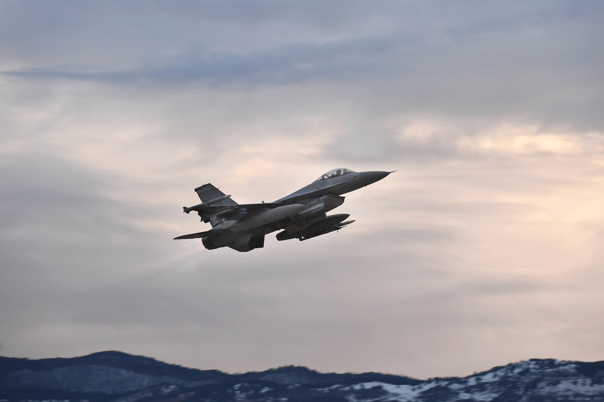 A U.S. Air Force F-16 Fighting Falcon assigned to the 555th Fighter Squadron takes off from Aviano Air Base, Italy, Dec. 16, 2020, during an Agile Combat Employment exercise. The F-16s executed close air support at Rivolto Air Base, Italy. Airmen from the 31st Maintenance Group and 31st Civil Engineer Squadron also worked on the aircraft with Italian counterparts from the 2nd Wing of the Italian air force. (U.S. Air Force photo by Staff Sgt. Valerie Halbert)