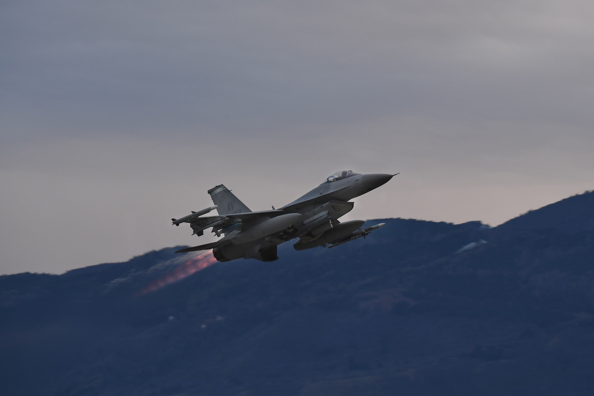 A U.S. Air Force F-16 Fighting Falcon assigned to the 555th Fighter Squadron takes off from Aviano Air Base, Italy, Dec. 16, 2020, during an Agile Combat Employment exercise. During the exercise, Airmen trained to enhance our ability to rapidly deploy to and operate from locations with varying levels of capacity and support, ensuring Airmen and aircrews are postured to provide lethal combat power across the spectrum of military operations. (U.S. Air Force photo by Staff Sgt. Valerie Halbert)