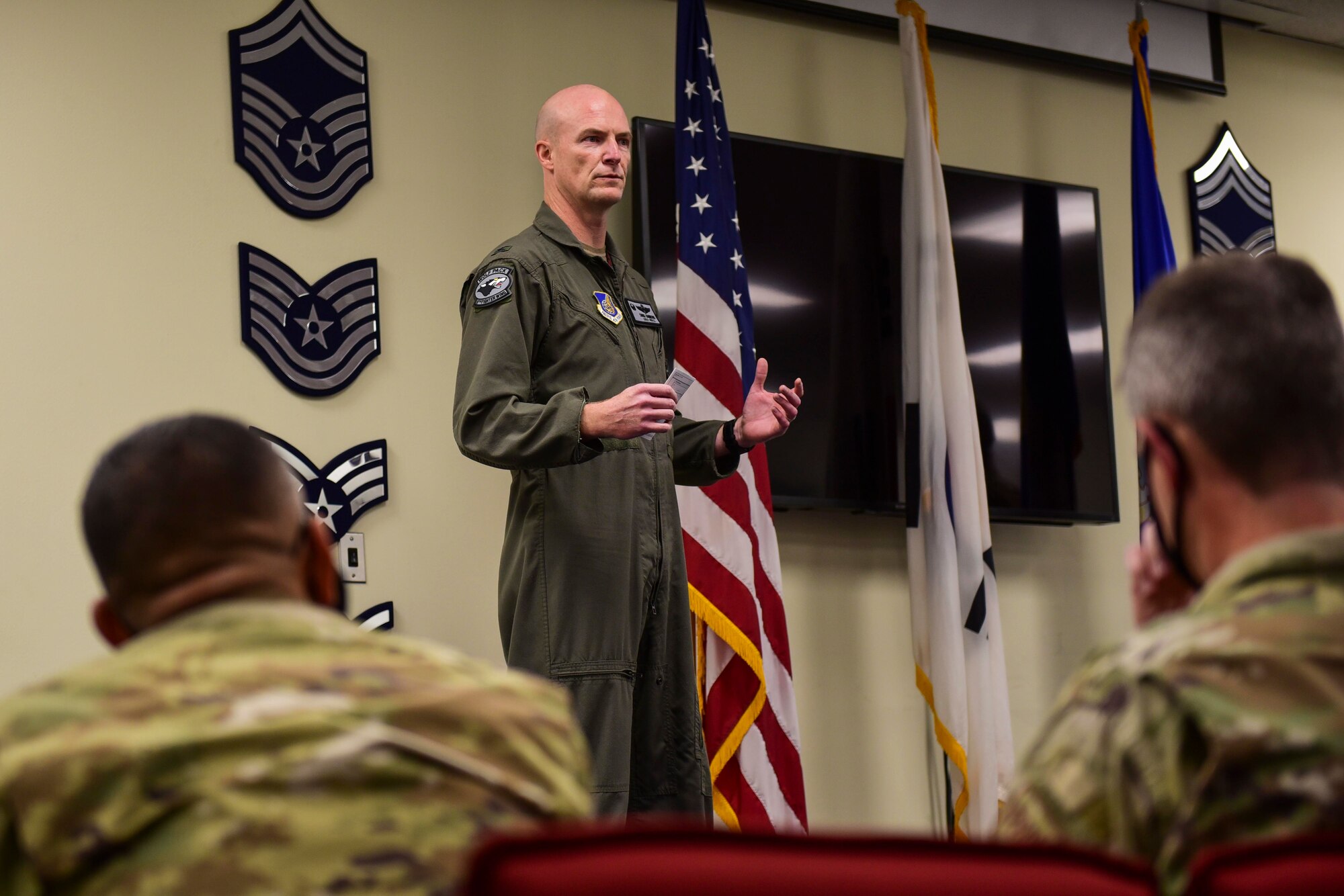 A commander speaking to Airpower Leadership Academy graduates.