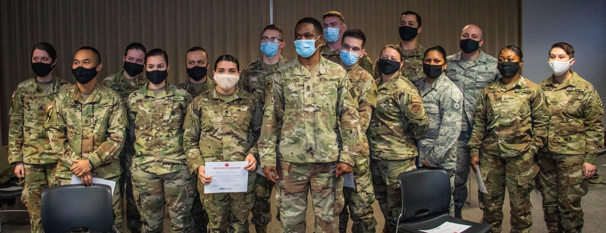 U.S. Army Soldiers and U.S. Air Force Airmen of the Georgia National Guard graduated from Grady Memorial Hospital Education Center’s Emergency Medical Services Advanced Emergency Medical Technician Program on December 16, 2020 at Grady Memorial Hospital in Atlanta, Georgia. The course provided the service members with advanced medical training necessary to provide elevated medical care to their units. (U.S. Army National Guard photo by Cpl. Isaiah Matthews)