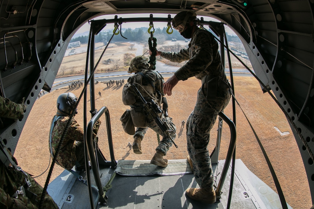 U.S. Marines conduct fast roping during exercise Forest Light Eastern Army in mainland Japan, Dec. 10.