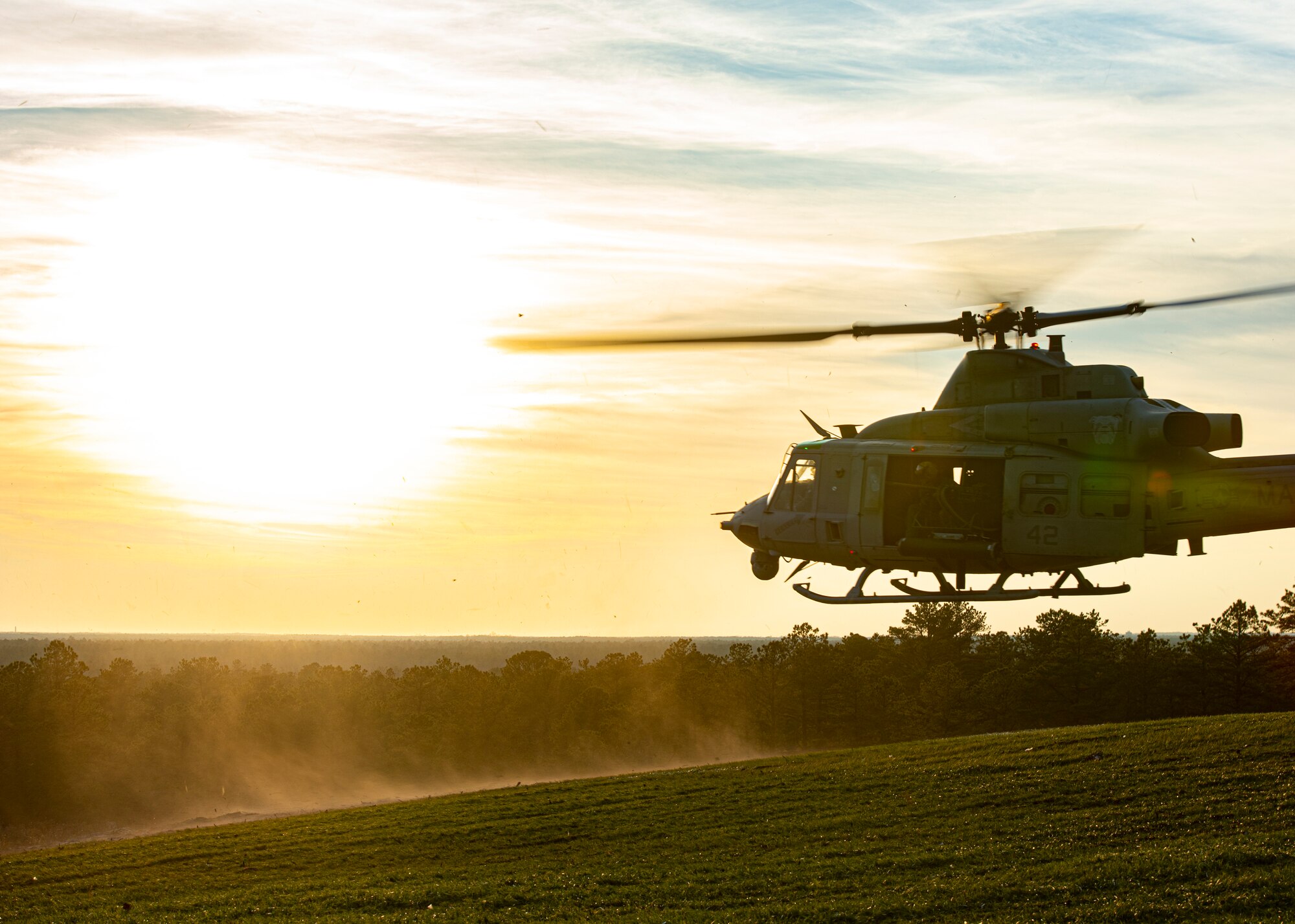 A helicopter flies at Joint Base MDL.