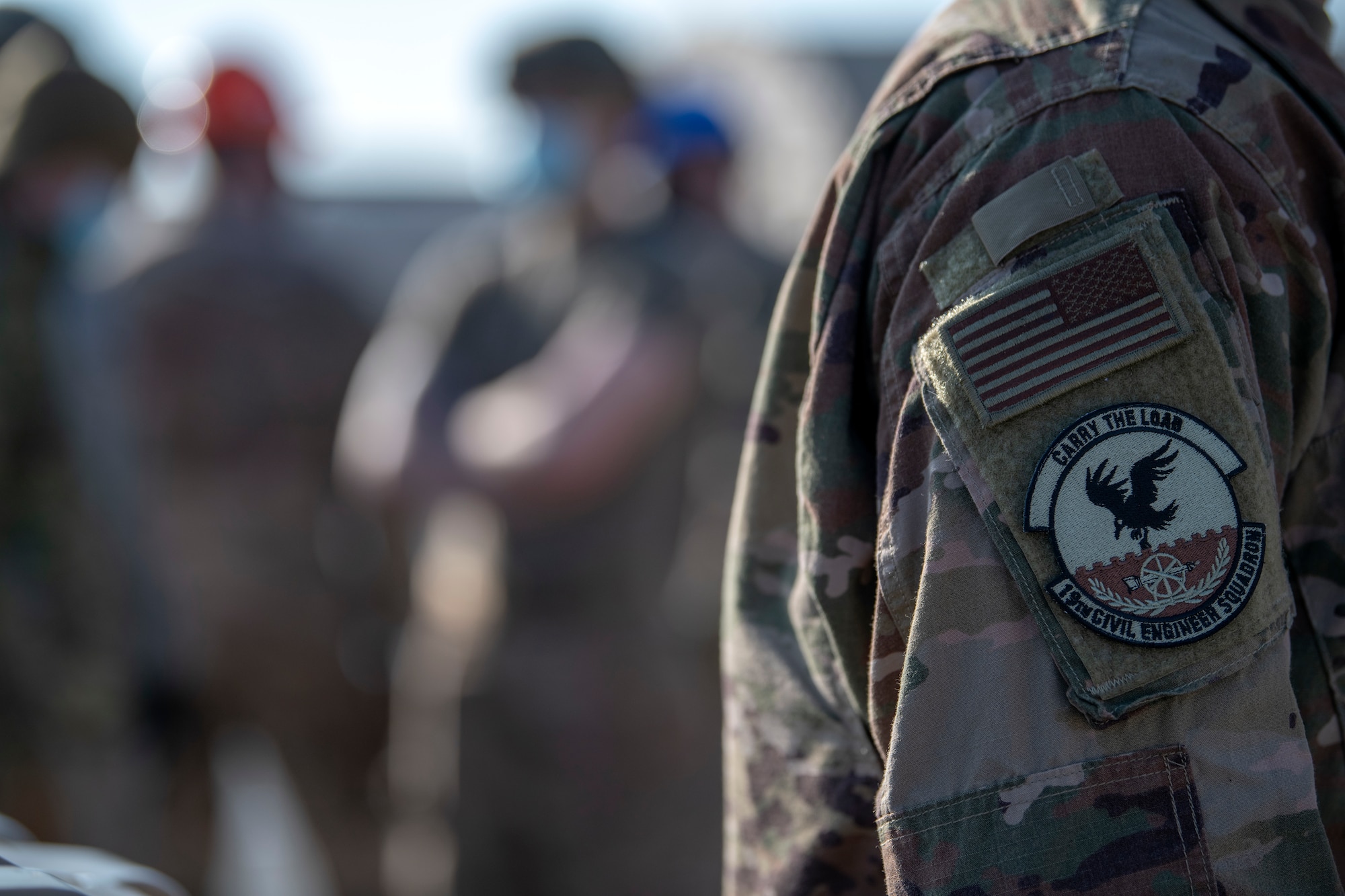the 19 CES Patch rests on the shoulder of an Airman