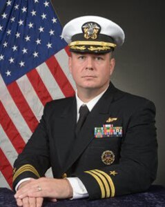 Studio portrait of Cmdr. Christopher R. Cummins