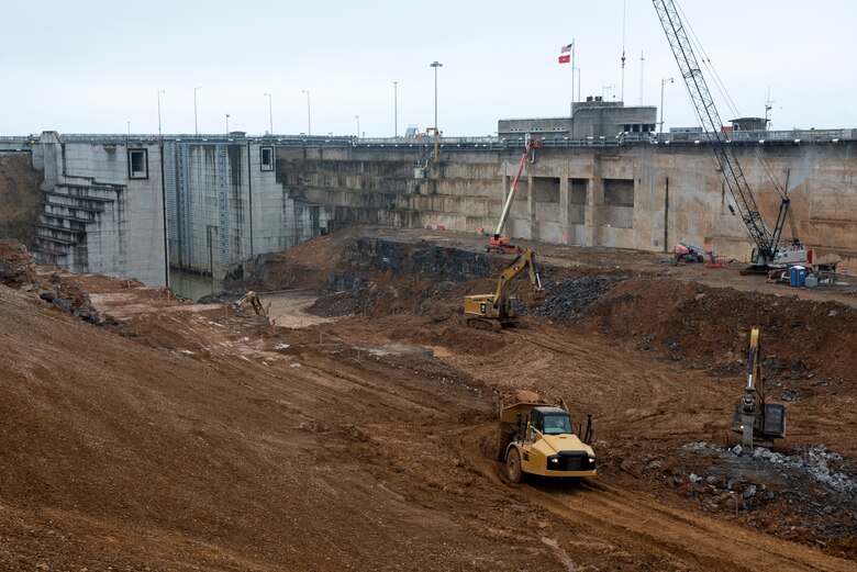 Work crews with Heeter Geotechnical Construction excavate dirt and rock at the Kentucky Lock Addition Project Dec. 16, 2020 at Grand Rivers, Kentucky, where the U.S. Army Corps of Engineers Nashville District is constructing the new 110-foot by 1,200-foot navigation lock at the Tennessee Valley Authority project. (USACE Photo by Lee Roberts)