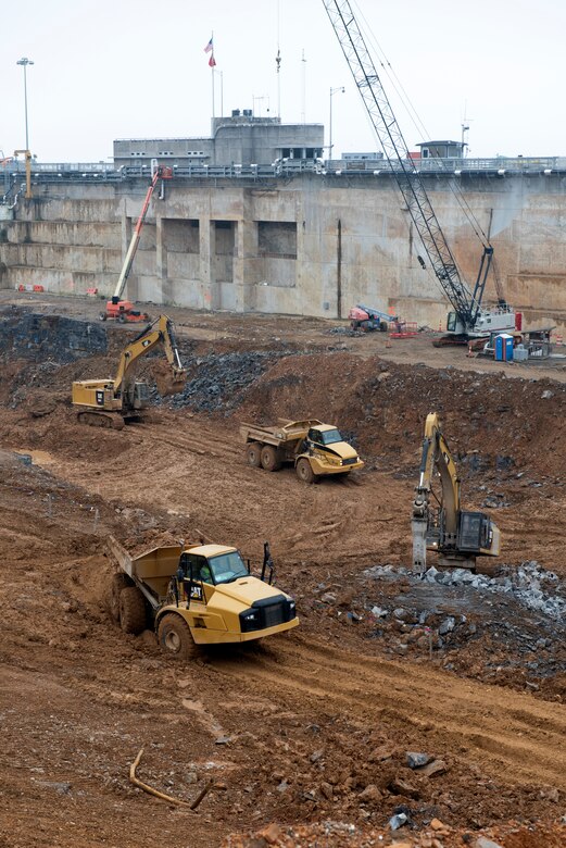 Work crews with Heeter Geotechnical Construction excavate dirt and rock at the Kentucky Lock Addition Project Dec. 16, 2020 at Grand Rivers, Kentucky, where the U.S. Army Corps of Engineers Nashville District is constructing the new 110-foot by 1,200-foot navigation lock at the Tennessee Valley Authority project. (USACE Photo by Lee Roberts)