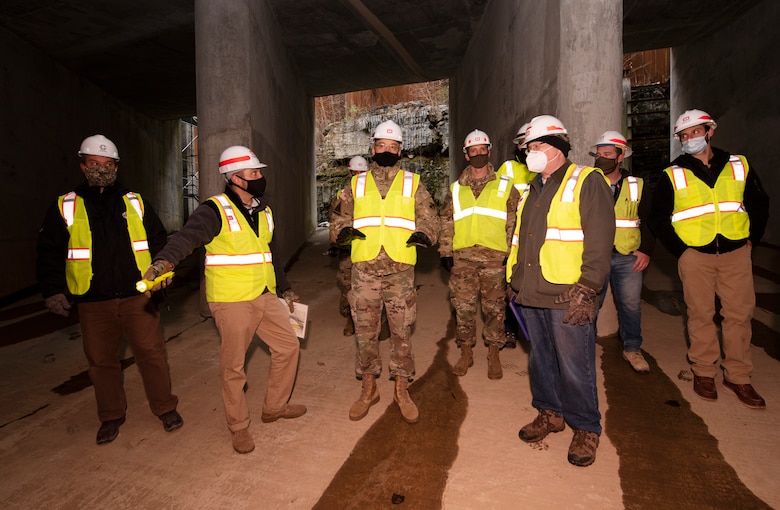 Maj. Gen. William (Butch) H. Graham (Third from Left), U.S. Army Corps of Engineers commanding general for Civil and Emergency Operations, tours the inside of the completed intake valves on the upper end of the lock chamber at the Kentucky Lock Addition Project Dec. 16, 2020 in Grand Rivers, Kentucky. (USACE Photo by Lee Roberts)