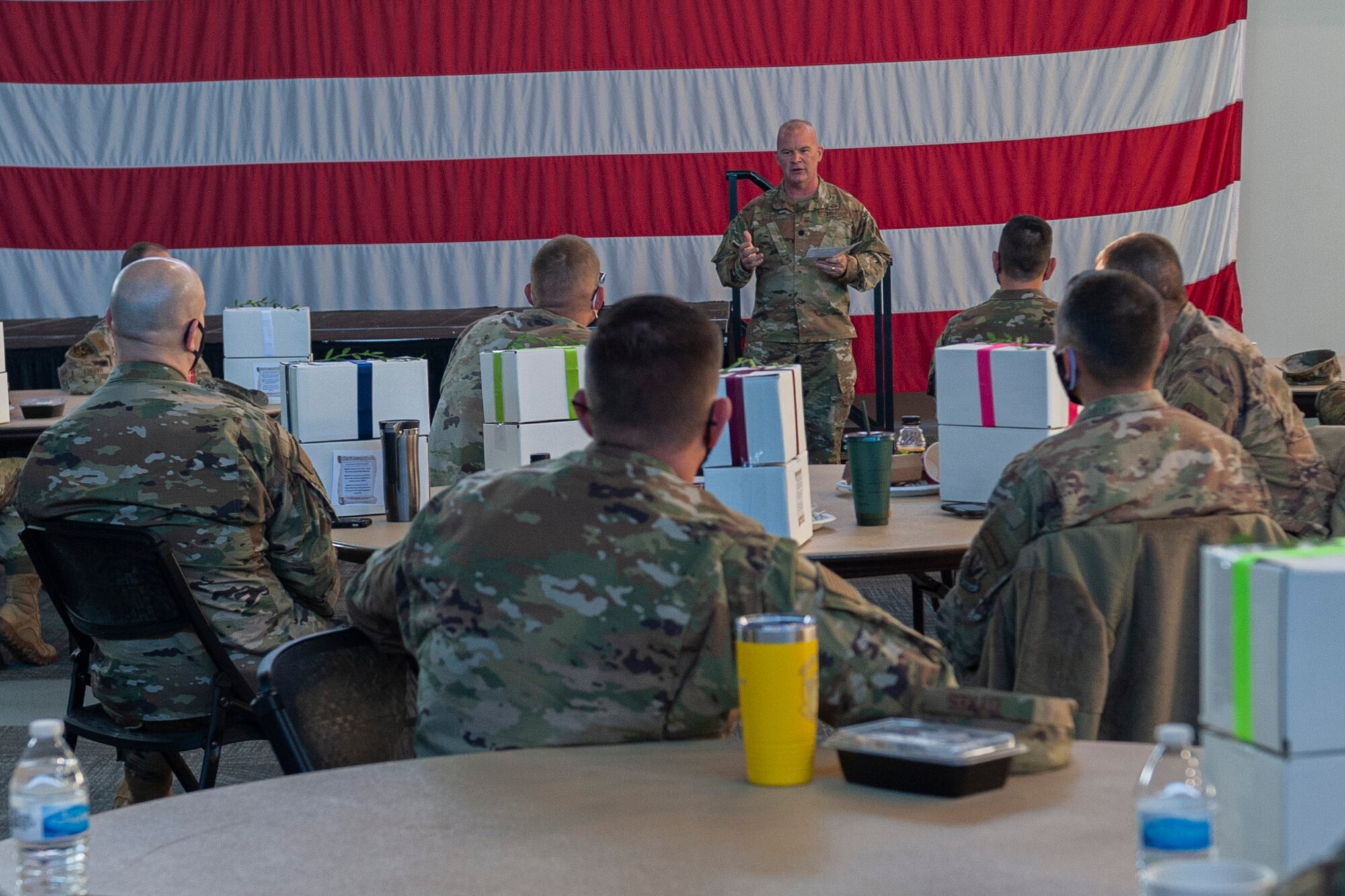 A photo of a Chaplain speaking.