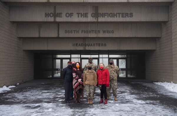 Members of Mountain Home Air Force Base COVID-19 Task Force congregate outside the 366th Fighter Wing Headquarters’ building, at MHAFB, Idaho, 16 Dec., 2020. Consisting of multiple squadrons, the CTF was developed to understand and synthesize COVID travel and mitigation guidance from various Air Force, DoD and public health authorities. (U.S. Air Force photo by Airman 1st Class Gary Hilton)