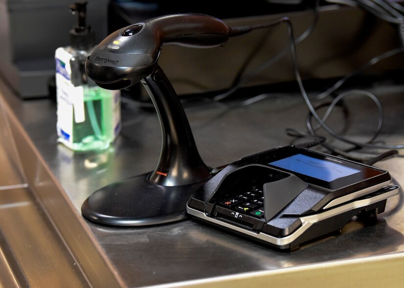 A secured card scanner lies ready for use in the Guardian Dining Facility.