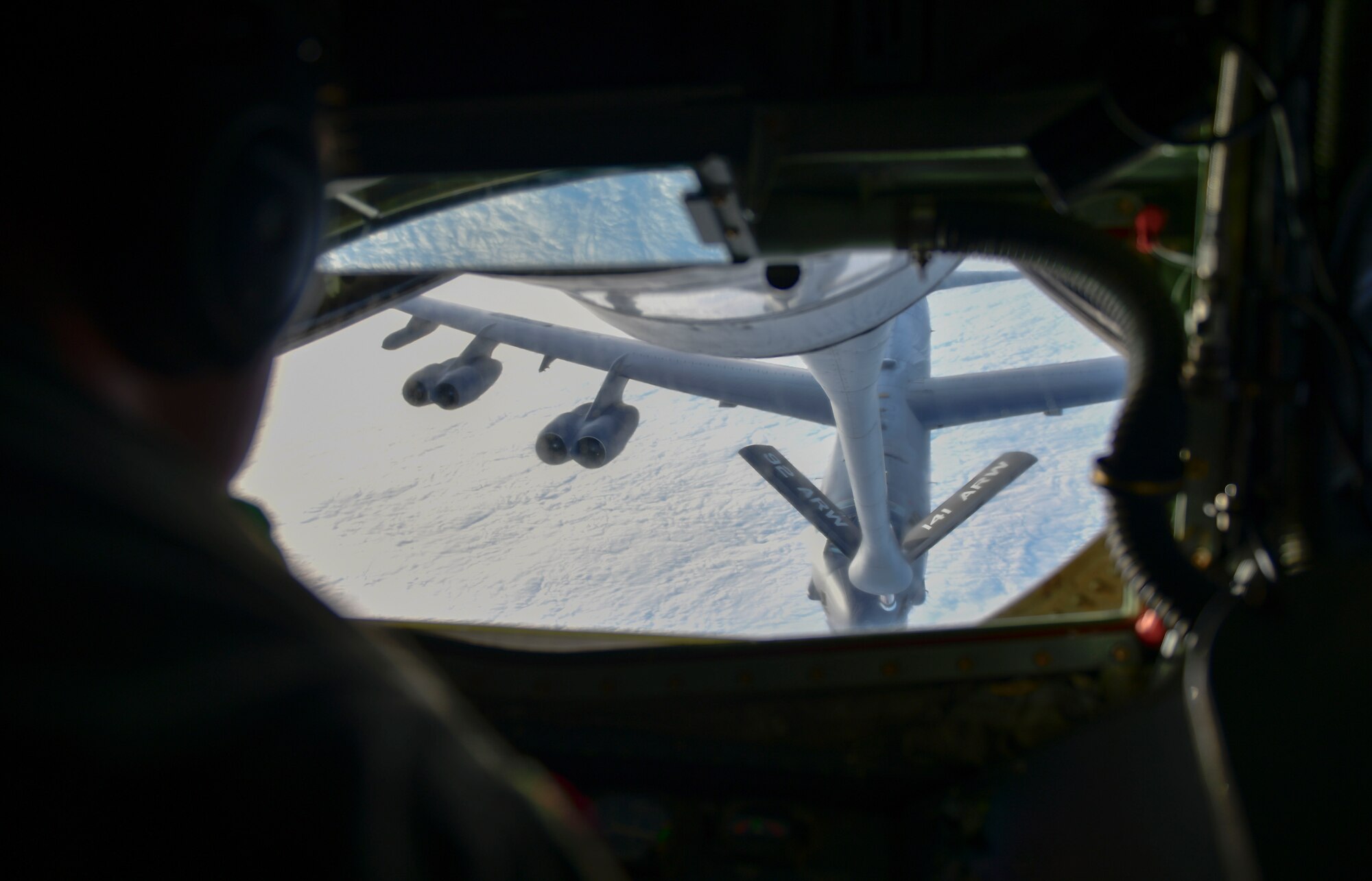 U.S. Air Force Airman 1st Class Bradley Betts, 93rd Air Refueling Squadron boom operator, refuels a Minot Air Force Base B-52 Stratofortress during exercise Titan Fury at Fairchild Air Force Base, Washington, Dec. 11, 2020. The U.S. military’s ability to respond to global threats and emergencies would be almost impossible without the KC-135 and the men and women that keep it and themselves sharp and ready. (U.S. Air Force photo by Senior Airman Ryan Gomez)