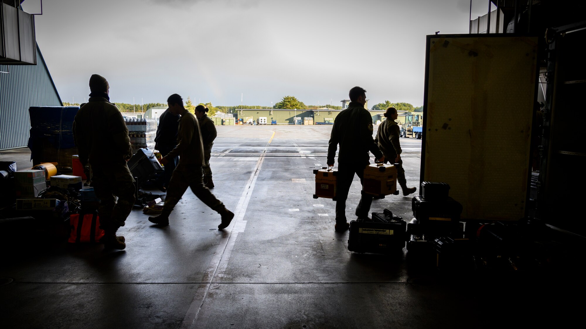 U.S. Air Force 35th Fighter Wing Airmen move cargo during Agile Combat Employment week at Misawa Air Base, Japan, Dec. 6, 2020. This concept strengthens our “Fight Tonight” mentality, ensuring the preparation of personnel for no notice contingencies and the capability of Airmen to rapidly deploy and operate out of an austere location. (U.S. Air Force photo by Airman 1st Class China M. Shock)