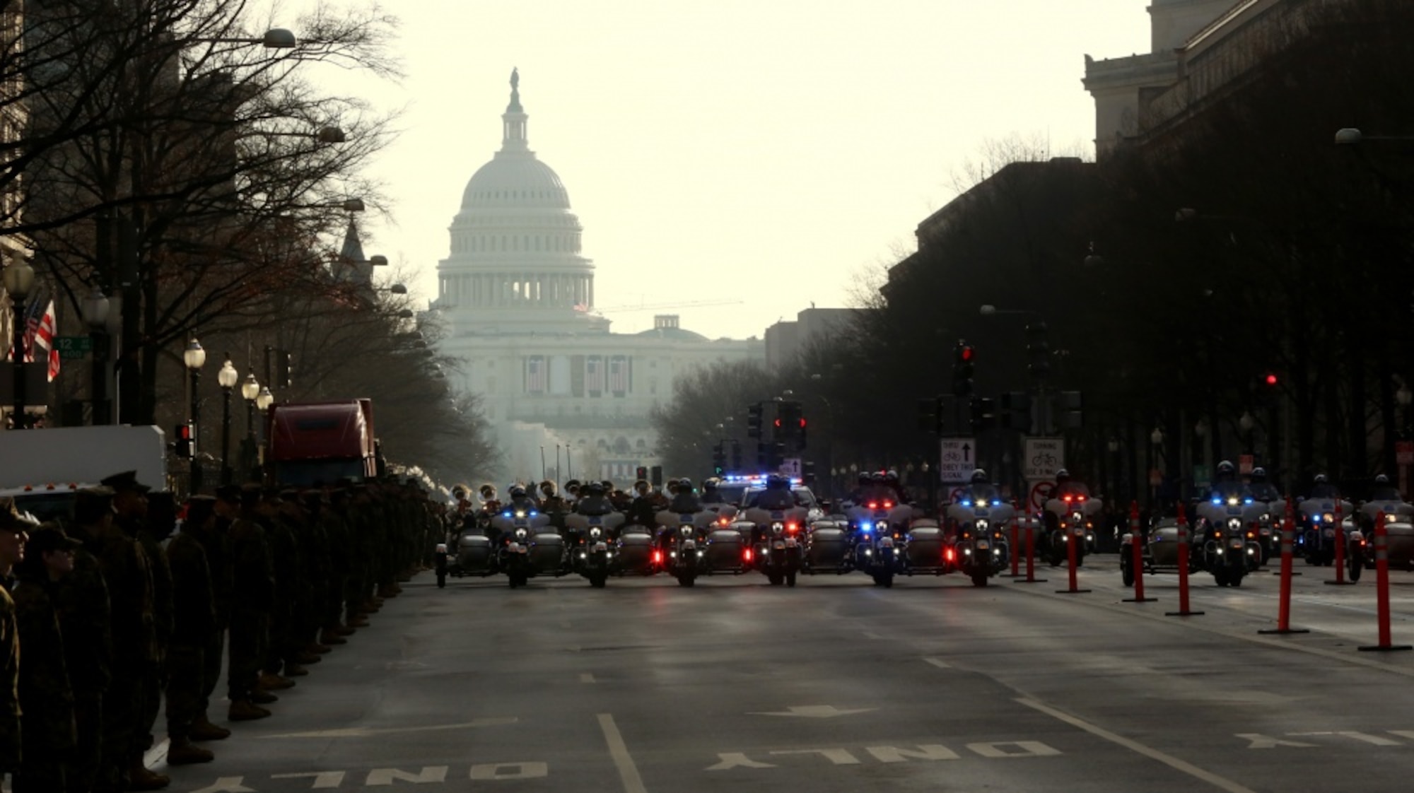 Members of the Police Task Force escort members in the rehearsal parade on Pennsylvania Avenue in Washington, D.C., Jan. 15, 2017. More than 5,000 military members from across all branches of the armed forces of the United States, including Reserve and National Guard components, provided ceremonial support and Defense Support of Civil Authorities during the inaugural period. (DoD photo by U.S. Army Pfc. Jada Owens)