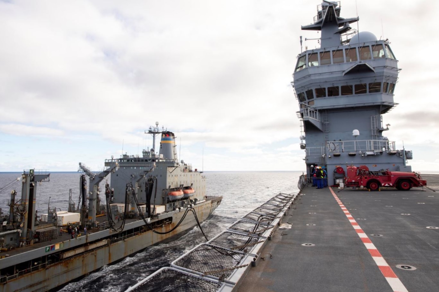 USNS Laramie (T-AO 203) completes a refueling-at-sea with Mistral-class LHD Dixmude (L9015) in the Atlantic Ocean, Dec. 10.