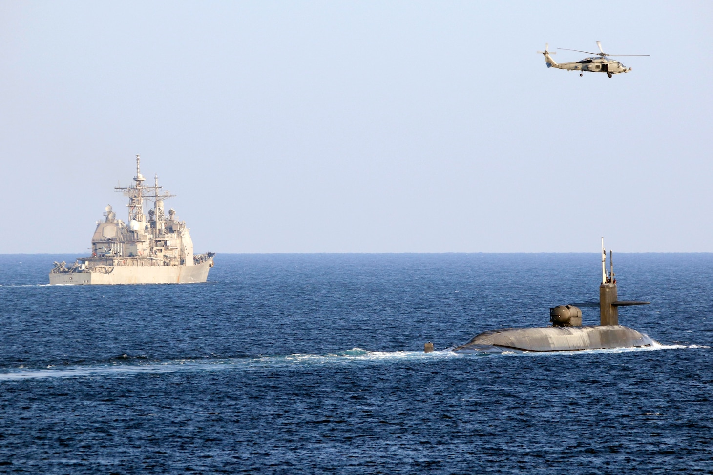 USS Port Royal (CG 73), USS Philippine Sea (CG 58) and USS Georgia (SSGN 729) transit the Strait of Hormuz.