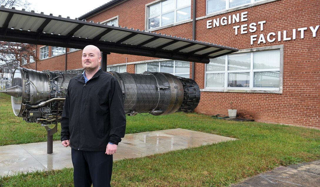Bryon Harrington, a test engineer for the Propulsion Test Branch, Test Division, Arnold Engineering Development Complex, stands outside the Sea Level Engine Test Cells at Arnold Air Force Base, Tenn., Dec. 4, 2020. Harrington served in the U.S. Air Force as a crew chief working on aircraft and engines. Now a test engineer himself, he shadowed a test engineer in the SL cells at Arnold when first learning the role. (U.S. Air Force photo by Jill Pickett)