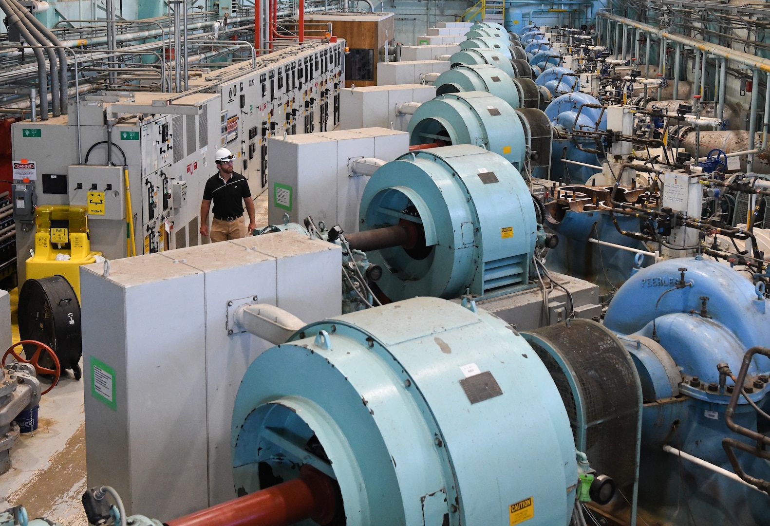 Joshua Cooke, an Arnold Engineering Development Complex senior utility manager, inspects a water pumping station, Sept. 10, 2020, at Arnold Air Force Base, Tenn. The AEDC Base Civil Engineering Branch oversees utilities at Arnold AFB. (U.S. Air Force photo by Jill Pickett)