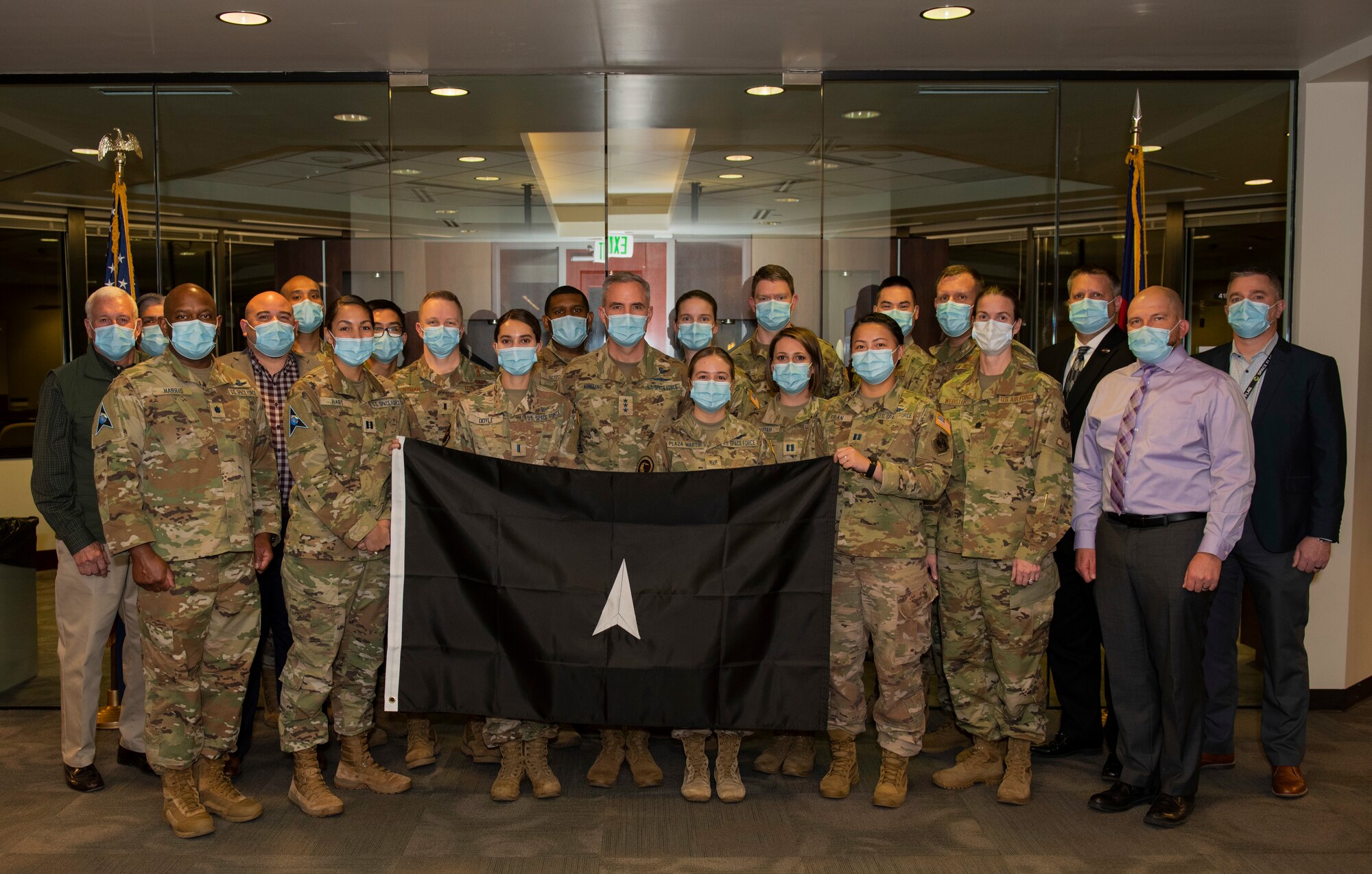 Lt. Gen. Stephen N. Whiting, Commander of Space Operations Command takes a group photo.