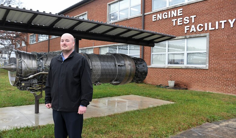Bryon Harrington, a test engineer for the Propulsion Test Branch, Test Division, Arnold Engineering Development Complex, stands outside the Sea Level Engine Test Cells at Arnold Air Force Base, Tenn., Dec. 4, 2020. Harrington served in the U.S. Air Force as a crew chief working on aircraft and engines. Now a test engineer himself, he shadowed a test engineer in the SL cells at Arnold when first learning the role. (U.S. Air Force photo by Jill Pickett)