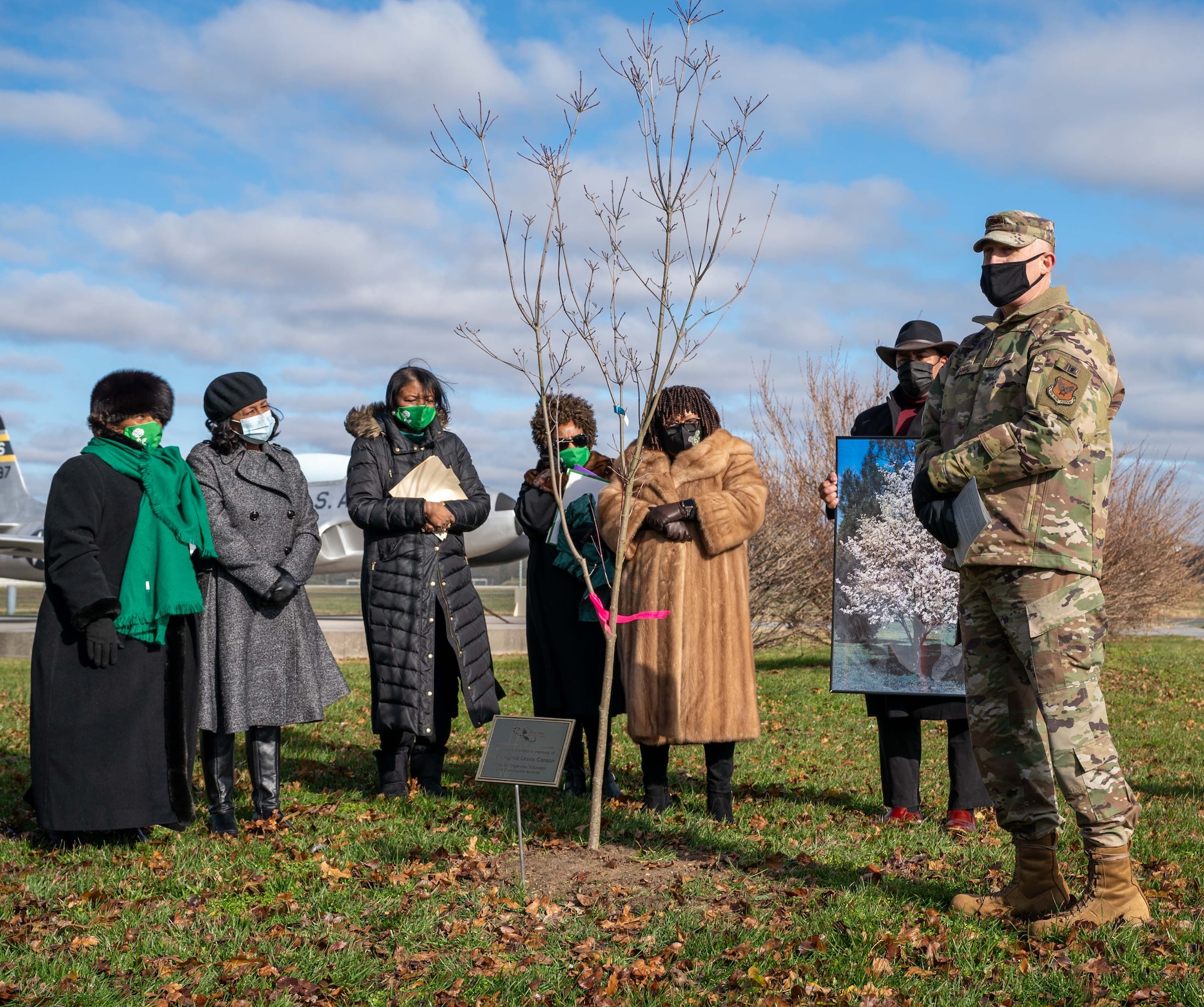 Col. Brian Eddy, Air Force Mortuary Affairs Operations commander, speaks at a tree dedication ceremony Dec. 17, 2020 at the Air Mobility Command at Dover Air Force Base, Delaware. The ceremony celebrated the life of Carson, a prominent Delaware educator who passed away Sept. 3, 2019. Carson’s husband was a civilian mortician for the United States Air Force for whom the Air Force Mortuary Affairs Operations facility is named after - The Charles C. Carson Center for Mortuary Affairs. (U.S. Air Force photo by Airman 1st Class Faith Schaefer)