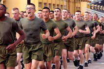 New Marines with Golf Company, 2nd Recruit Training Battalion, participate in a motivational run at Marine Corps Recruit Depot, San Diego, Dec. 17, 2020.