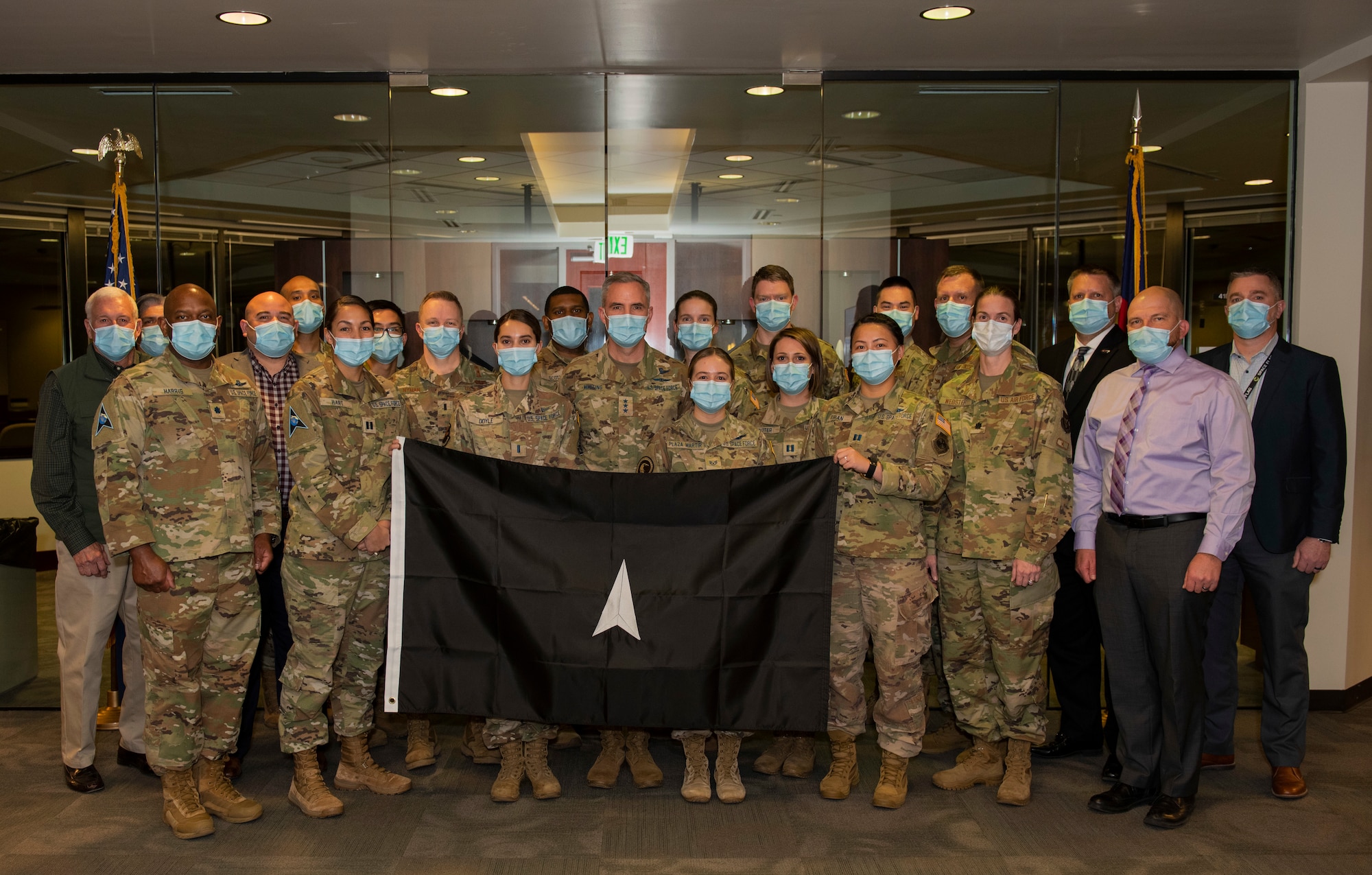 Lt. Gen. Stephen N. Whiting, Commander of Space Operations Command takes a group photo.