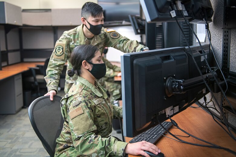 Capt. Chris Huynh demonstrating the ability to react to a thinking adversary and operate as a warfighter to SrA. Delia Vega at Schriever Air Force Base on Dec. 07, 2020.