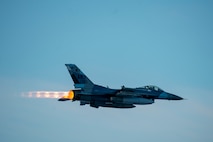 A U.S. Air Force F-16 Fighting Falcon assigned to the 354th Fighter Wing flies over Eielson Air Force Base, Alaska, Dec. 18, 2020.