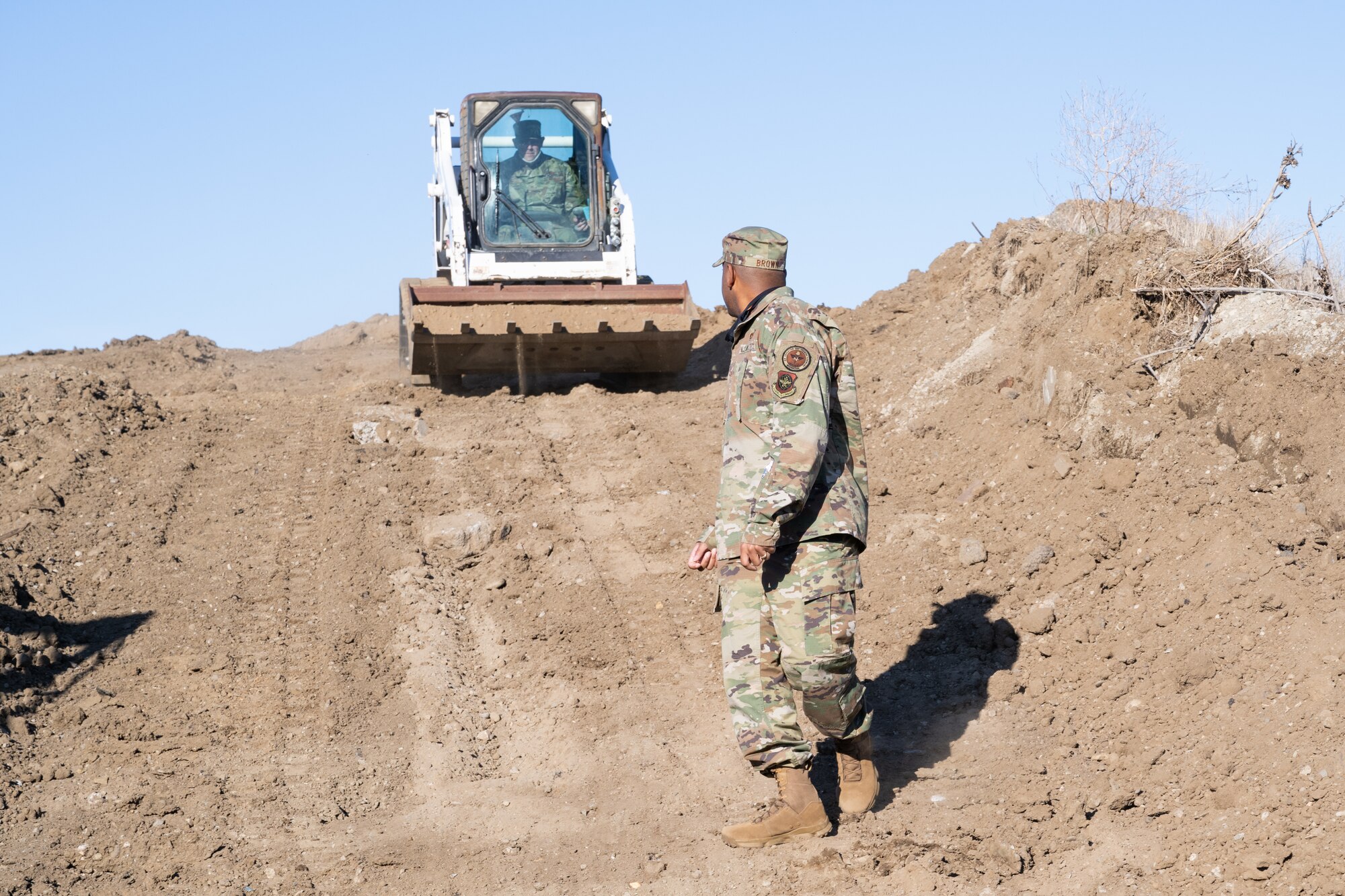 Commander drives a compact track loader.