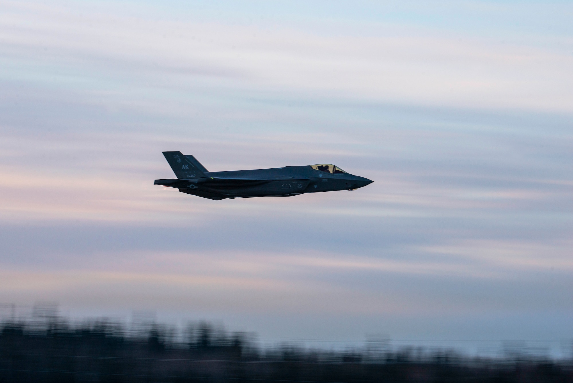 A U.S. Air Force F-35A Lightning II assigned to the 354th Fighter Wing flies over Eielson Air Force Base, Alaska, Dec. 18, 2020.
