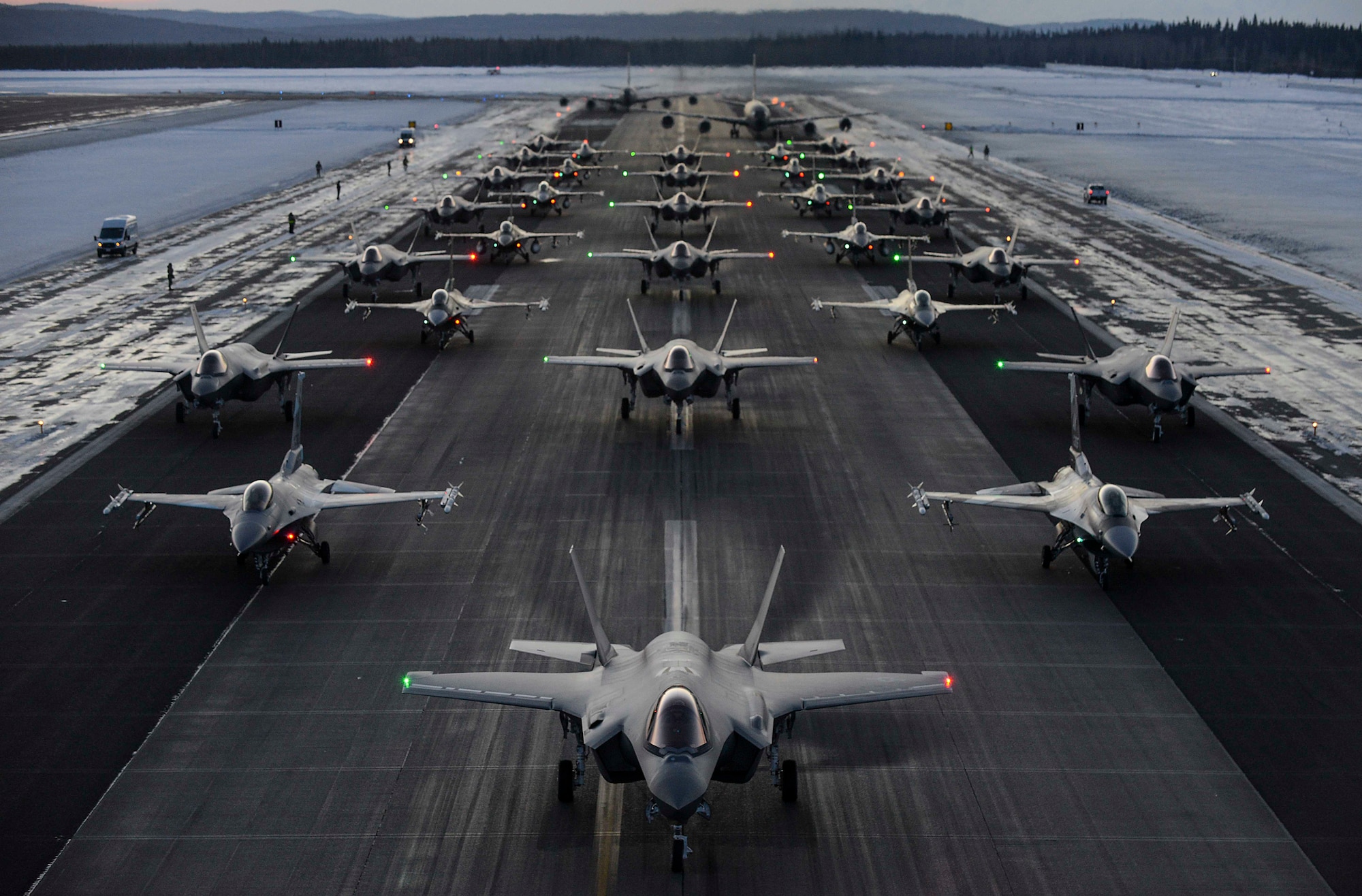 The 354th Fighter Wing and the Air National Guard’s 168th Wing aircraft line up in formation on Eielson Air Force Base, Alaska, Dec. 18, 2020.