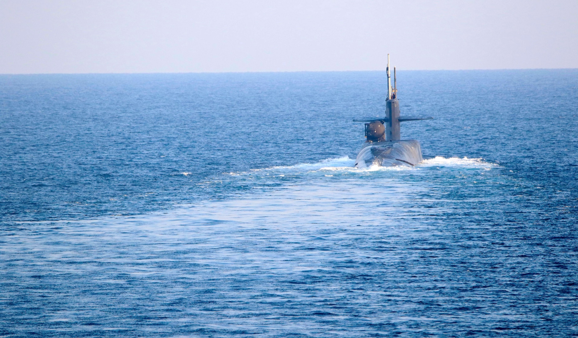 The guided-missile submarine USS Georgia (SSGN 729) transits the Strait of Hormuz, Dec. 21. Georgia is deployed to the U.S. 5th Fleet area of operations in support of naval operations to ensure maritime stability and security in the Central Region, connecting the Mediterranean and Pacific through the Western Indian Ocean and three critical chokepoints to the free flow of global commerce.