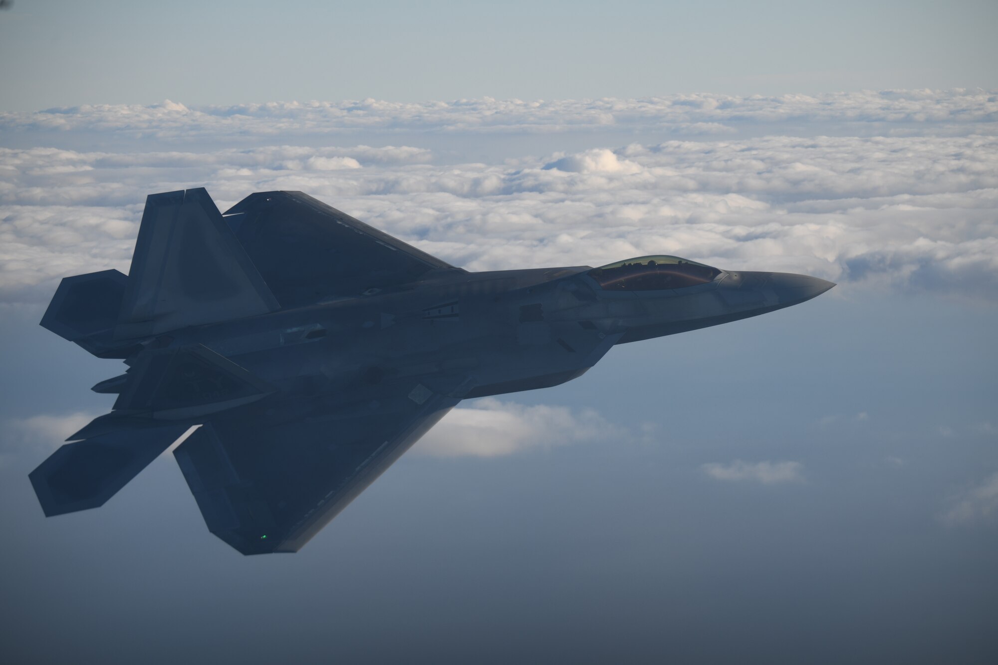 An  F-22 Raptor with the 325th Fighter Wing, Tyndall Air Force Base, Fla.  flies over the Gulf of Mexico, Dec. 10, 2020. Tyndall AFB is one of the few Air Force bases with direct access to the area, making it the perfect host for large-scale exercises and training missions. (U.S. Air Force photo by Airman 1st Class Tiffany Price)