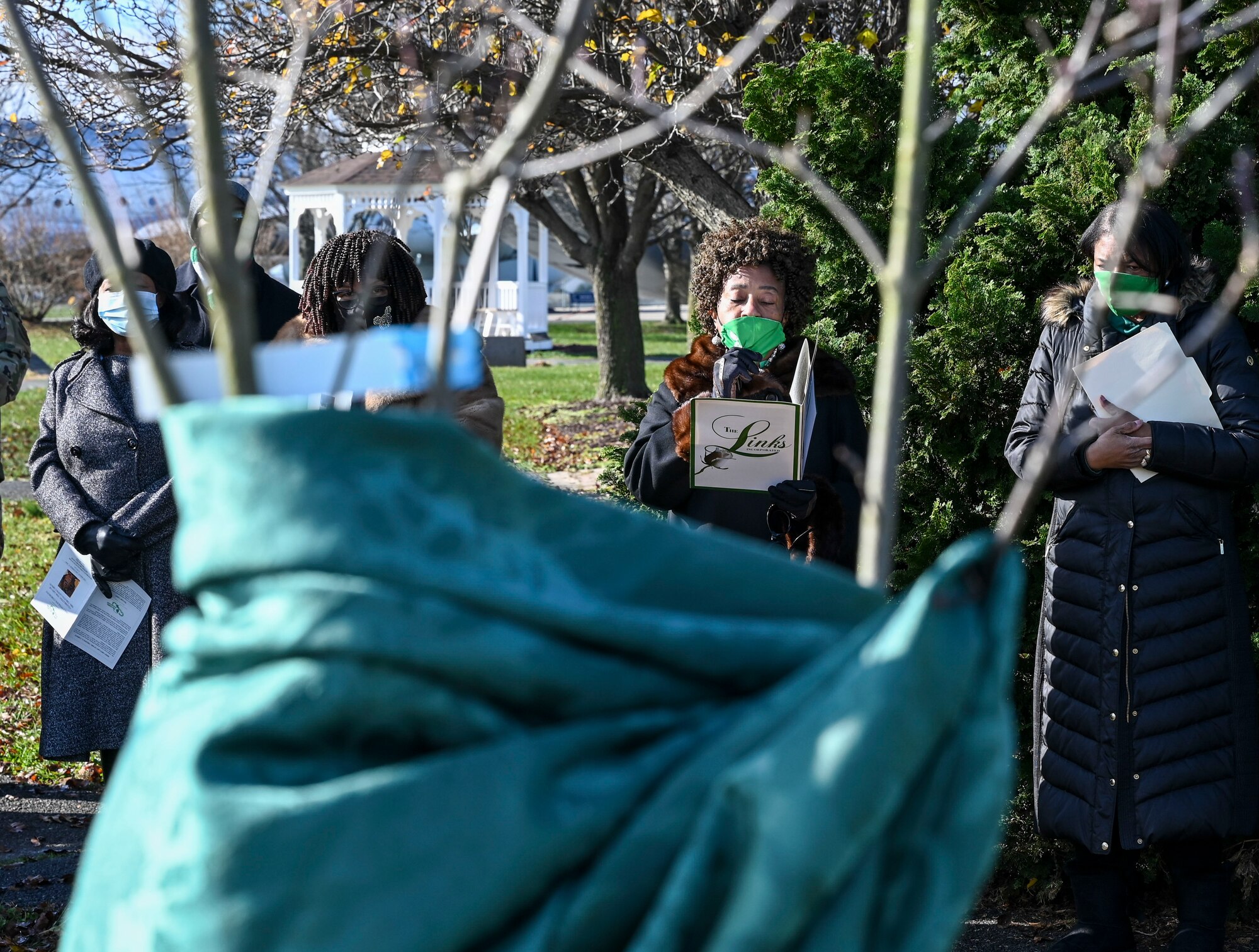 A member of the Links Incorporated, an international women’s volunteer service organization, gives a speech during a tree dedication ceremony Dec. 17, 2020 at the Air Mobility Command museum at Dover Air Force Base, Delaware. The ceremony celebrated the life of Carson, a Links Incorporated member and prominent Delaware educator who passed away Sept. 3, 2019. Carson’s husband Charles was a civilian mortician at the Dover Port Mortuary with the Department of the Air Force for 26 years.  (U.S. Air Force photo by Airman Cydney Lee)