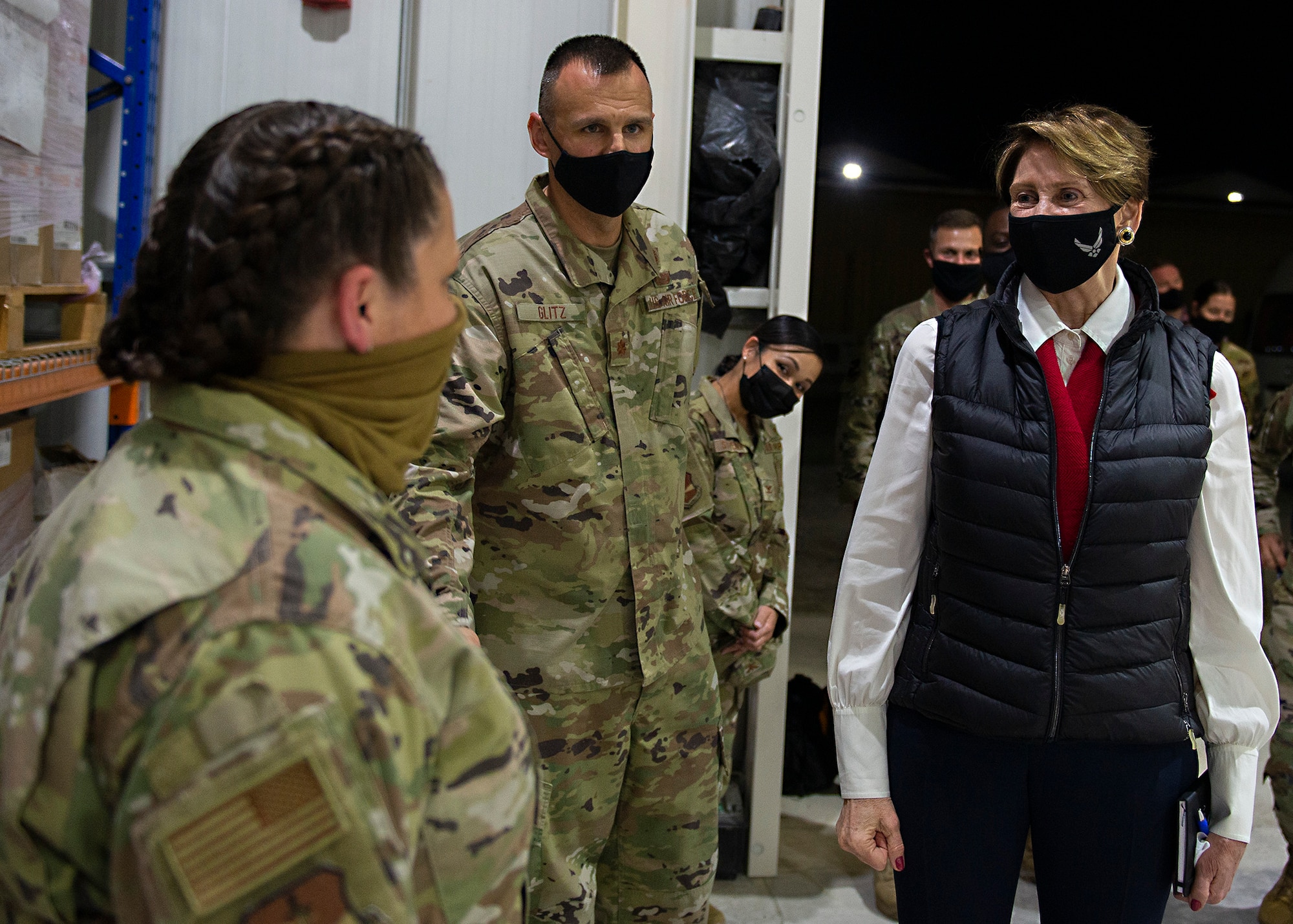 Secretary of the Air Force Barbara Barrett speaks with Airmen assigned to the 380th Expeditionary Medical Group (EMDG) during a visit to Al Dhafra Air Base, United Arab Emirates, Dec. 21, 2020.