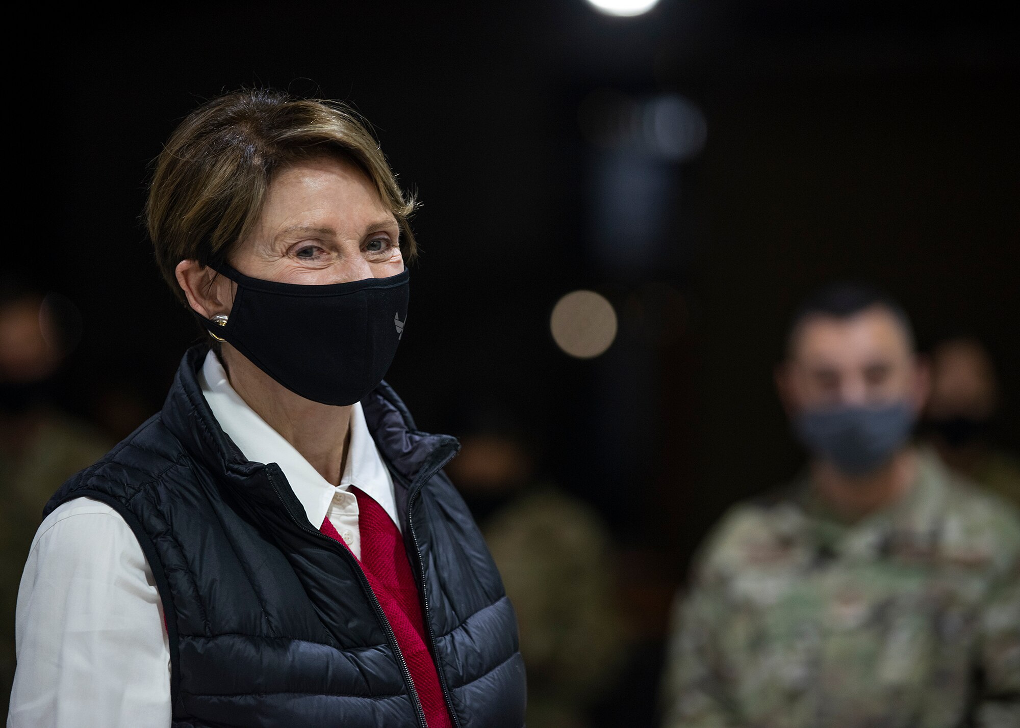 Secretary of the Air Force Barbara Barrett speaks with Airmen assigned to the 380th Expeditionary Medical Group during a visit to Al Dhafra Air Base, United Arab Emirates, Dec. 21, 2020.