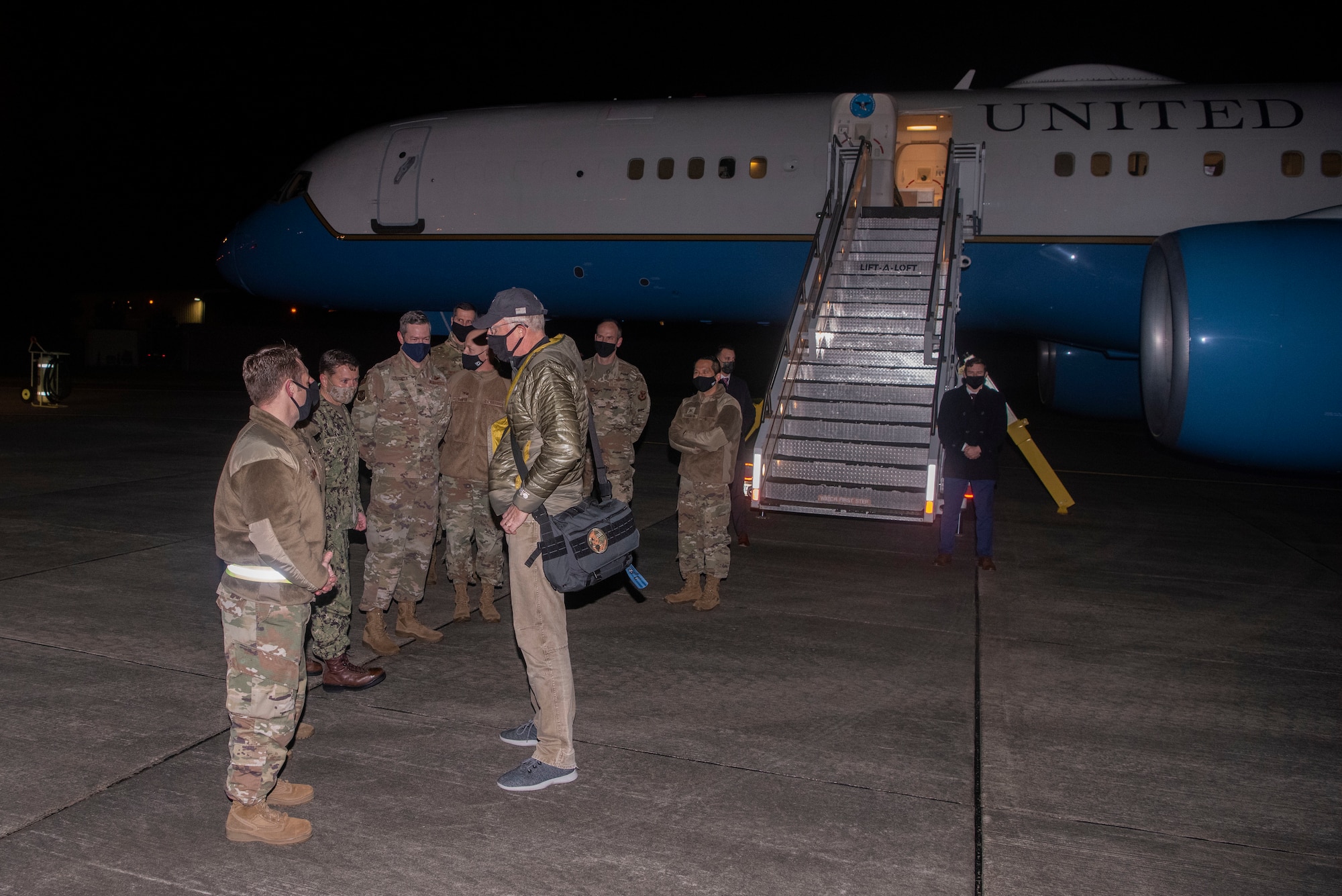 U.S. Acting Secretary of Defense Christopher Miller greets base leadership at Royal Air Force Mildenhall, England, Dec. 21, 2020. Miller came to the base to present the 2020 Secretary of Defense Maintenance Effectiveness Award to the 100th Maintenance Group. (U.S. Air Force photo by Airman 1st Class Joseph Barron)