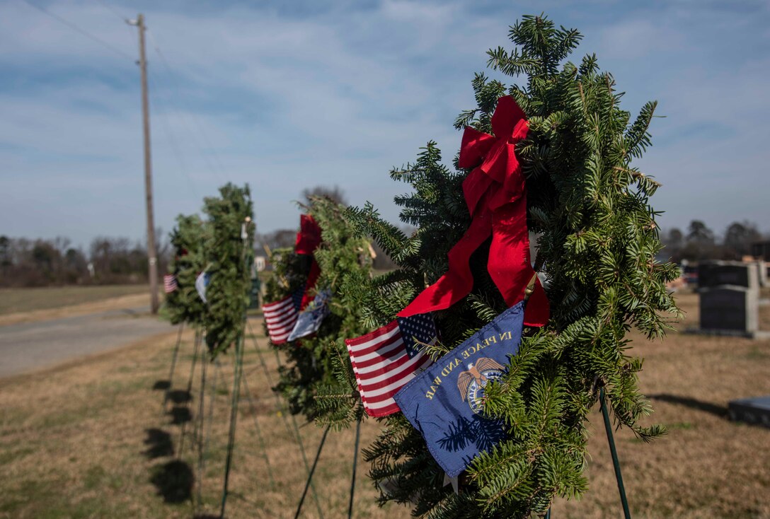 Airmen and local community members gather for the Wreaths Across America event