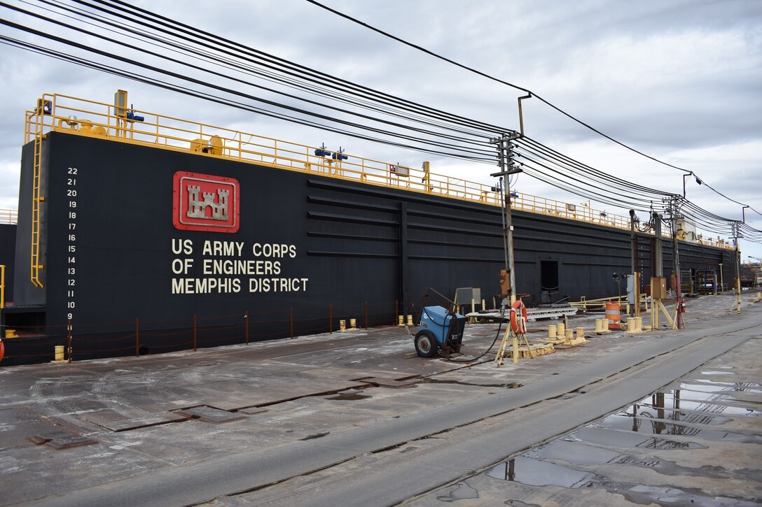 IN THE PHOTO, dry dock 5801 after it was serviced in Morgan City, Louisiana and back at Ensley Engineer Yard in Memphis, Tennessee. The dry dock was shipped to the Conrad Shipyard in Louisiana for repairs and maintenance in June 2019. The dock has been operating since 1958. (USACE photos by Jessica Haas)