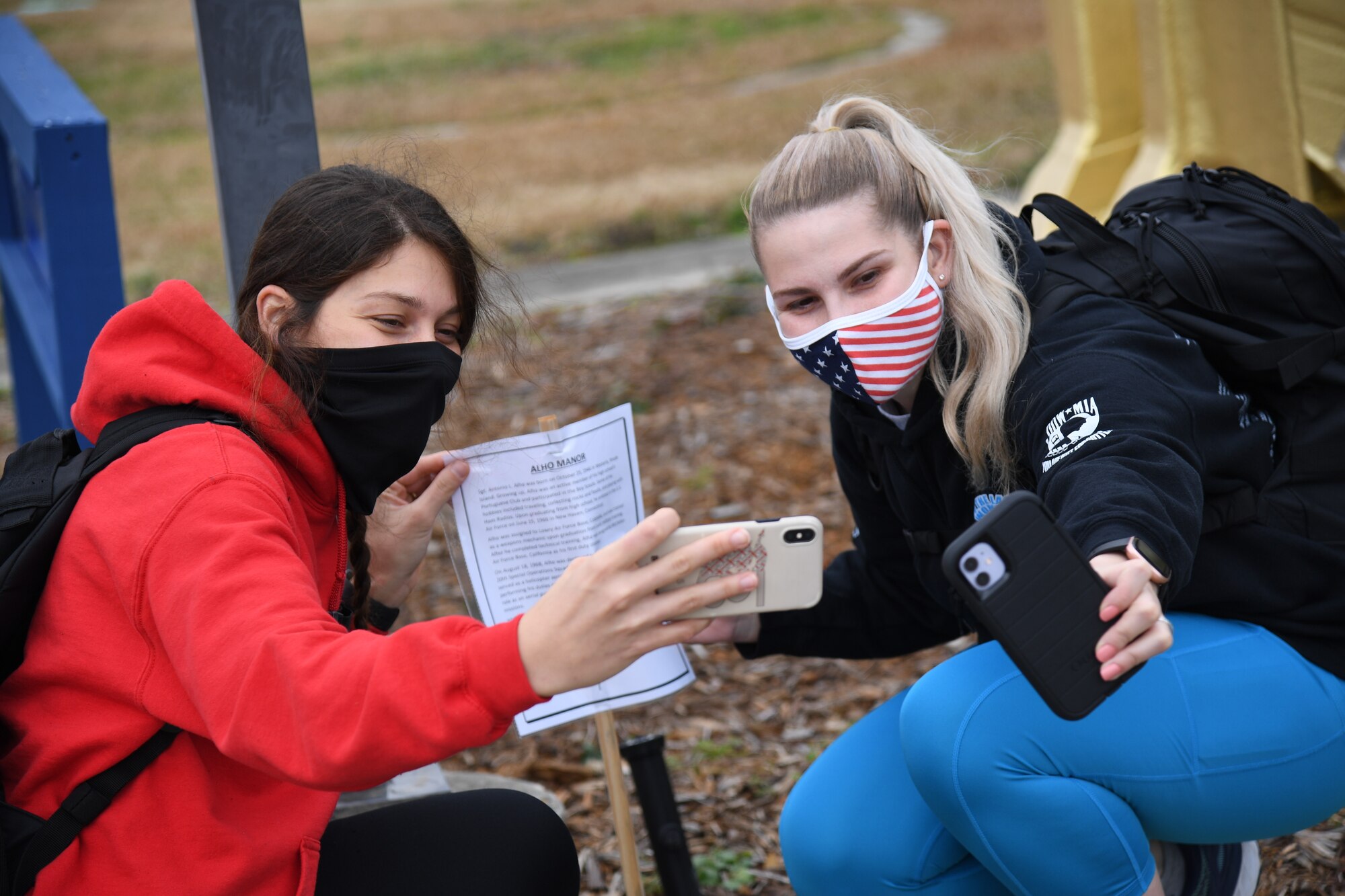U.S. Air Force Airman Jaclyn Collet and Airman 1st Class Erin Parkin, 336th Training Squadron, participate in a scavenger hunt at Keesler Air Force Base, Mississippi, Dec. 20, 2020. The 81st Training Group held various events for Airmen to participate in throughout the holidays, to include ice skating, inflatables, a scavenger hunt and a bubble ball soccer tournament. (U.S. Air Force photo by Kemberly Groue)