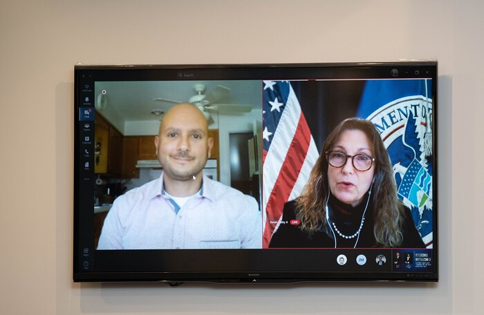 NSWC PHD Combat Systems Engineer Chris Fava (left) virtually accepts the Diversity and Inclusion Award from U.S. Citizen and Immigration Services Western Regional Director Kathy Baran during the NSWC PHD All Hands and Awards Ceremony, Wednesday, Dec. 9.