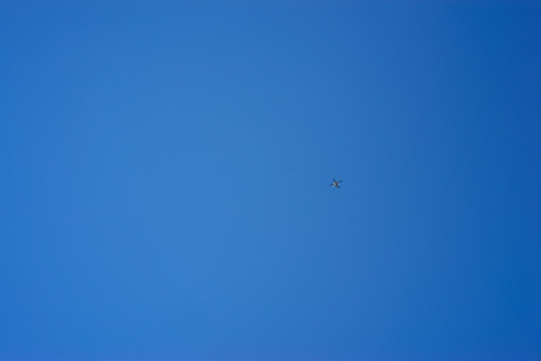A 51st Civil Engineering Squadron drone performs a roof inspection roughly 200 feet above Osan Air Base, Nov. 2, 2020. The 51st CES has incorporated the use of drones into the facility inspection process in close coordination with the 51st Operations Support Squadron, who overseas Air Traffic Control and airfield operations, to ensure the continued safety of the airfield while operating a non-standard flying operation in close proximity to the flightline. (U.S. Air Force photo by 1st Lt. Daniel de La Fé)