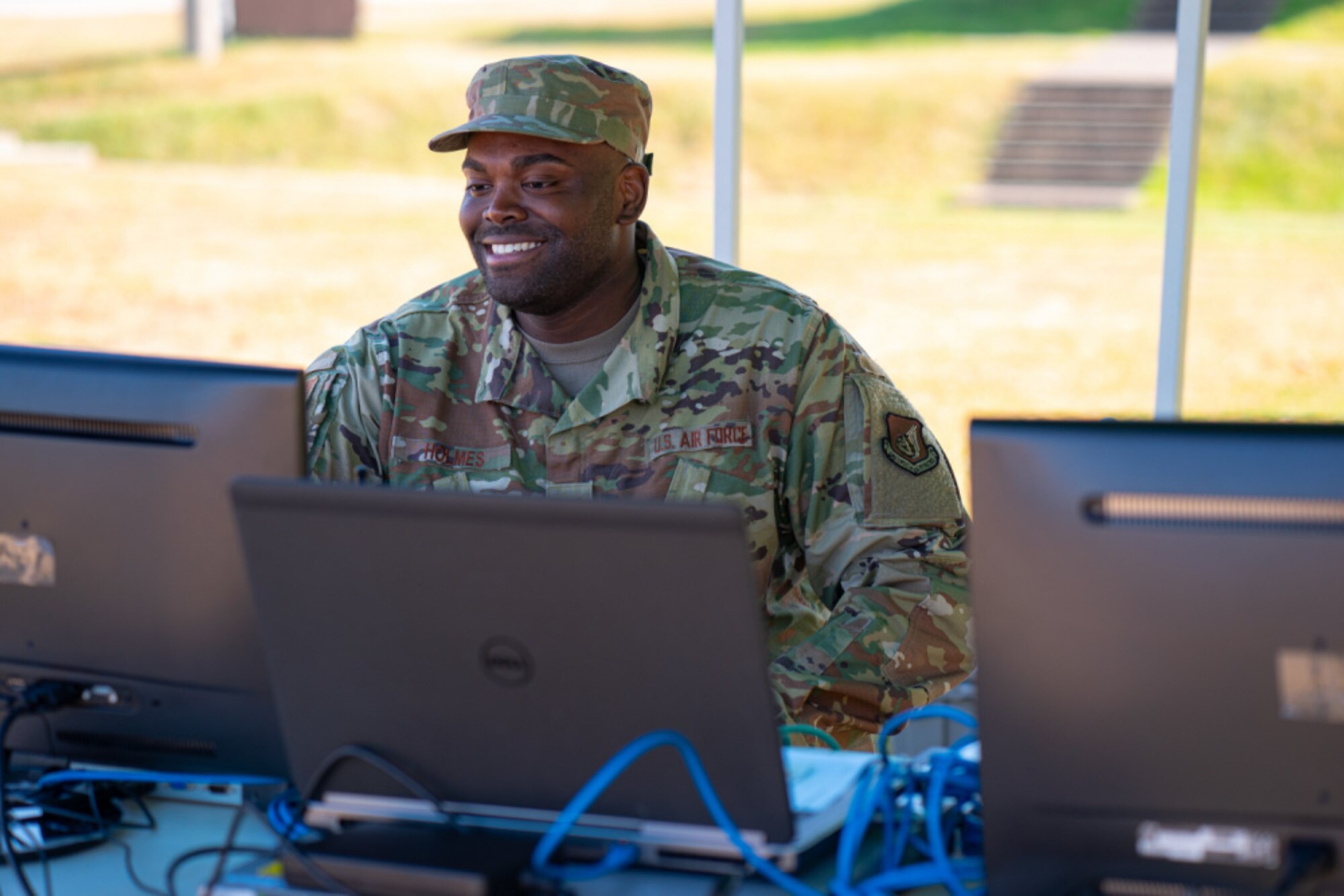 Staff Sgt. Jason Holmes, 51st Civil Engineer Squadron construction inspector, manages a facility inspection from a pop-up office outside of Osan Air Base’s Turumi Lodge, Nov. 2, 2020. The 51st CES coordinated with the 51st Operations Support Squadron, who manages Air Traffic Control and Airfield Operations, to institute a new roof inspection program, which utilizes the use of drones to remotely perform annual facility inspections. (U.S. Air Force photo by 1st Lt. Daniel de La Fé)