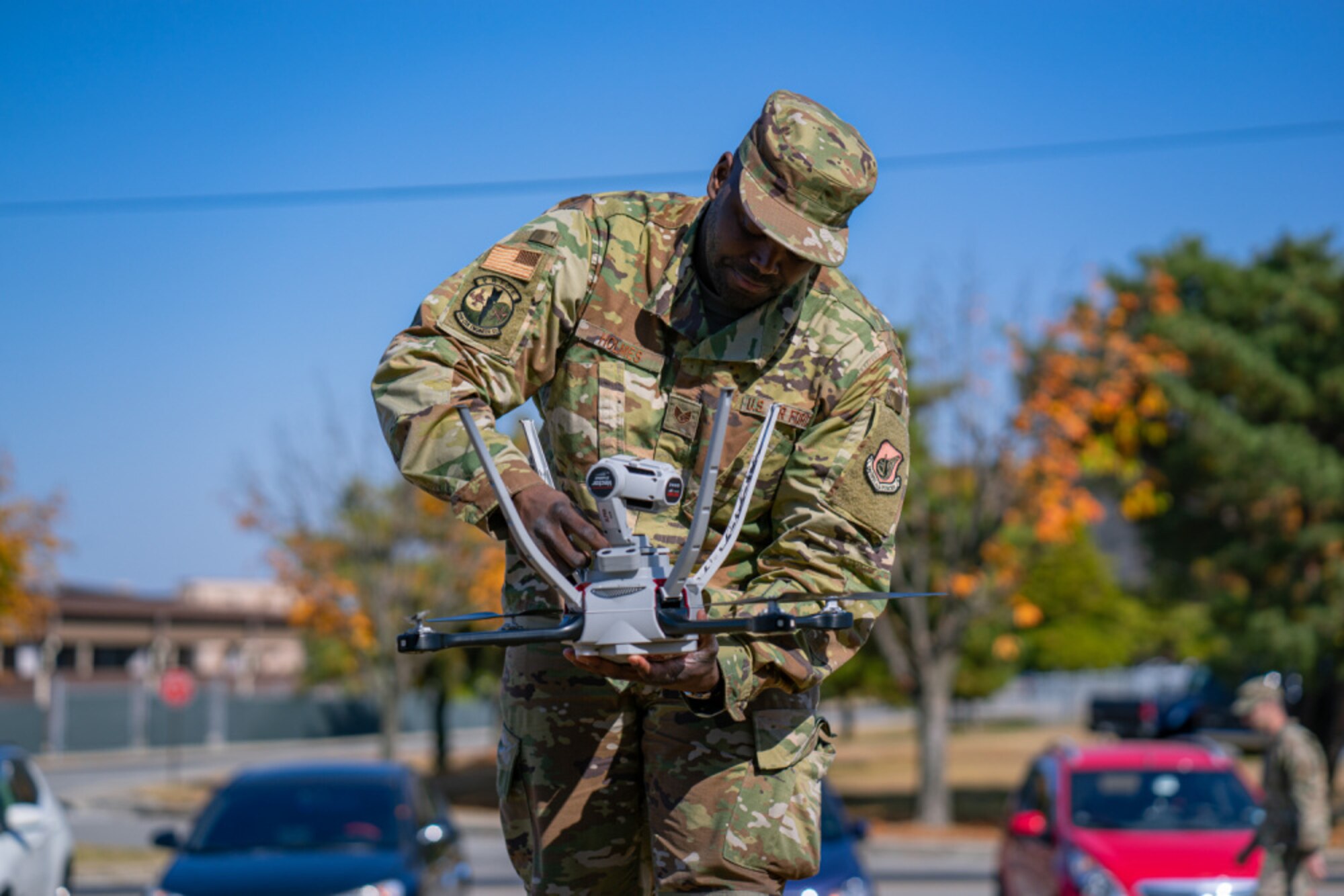 Staff Sgt. Jason Holmes, 51st Civil Engineer Squadron construction inspector, prepares a roof inspection drone for launch outside of Osan Air Base’s Turumi Lodge, Nov. 2, 2020. As the first Air Force unit to utilize drones to perform roof inspections, the 51st CES has made it possible for Airmen to perform their duties safely from the ground without risking rooftop falling hazards. (U.S. Air Force photo by 1st Lt. Daniel de La Fé)